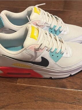 Nike White Sneakers with Black Swoosh and Pastel Accents